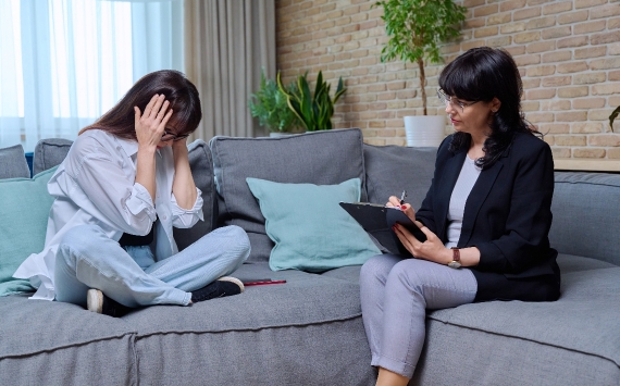 Woman venting frustrations to her mental health counsellor in Singapore