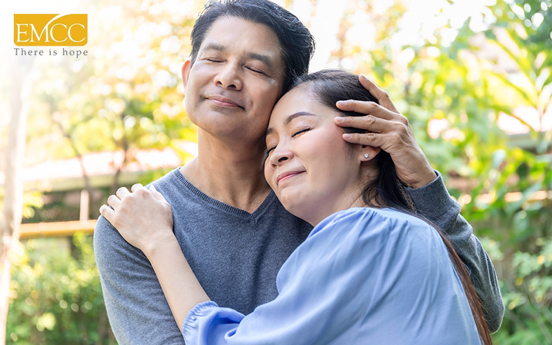 couple comforting each other