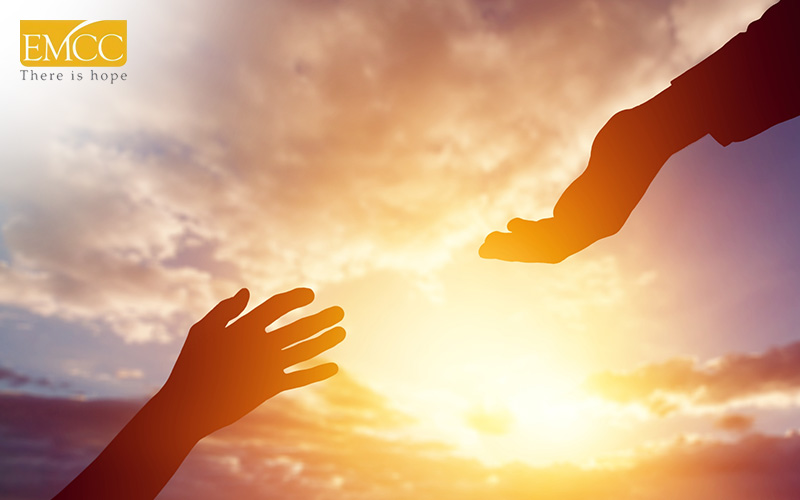 silhouette of hands reaching out